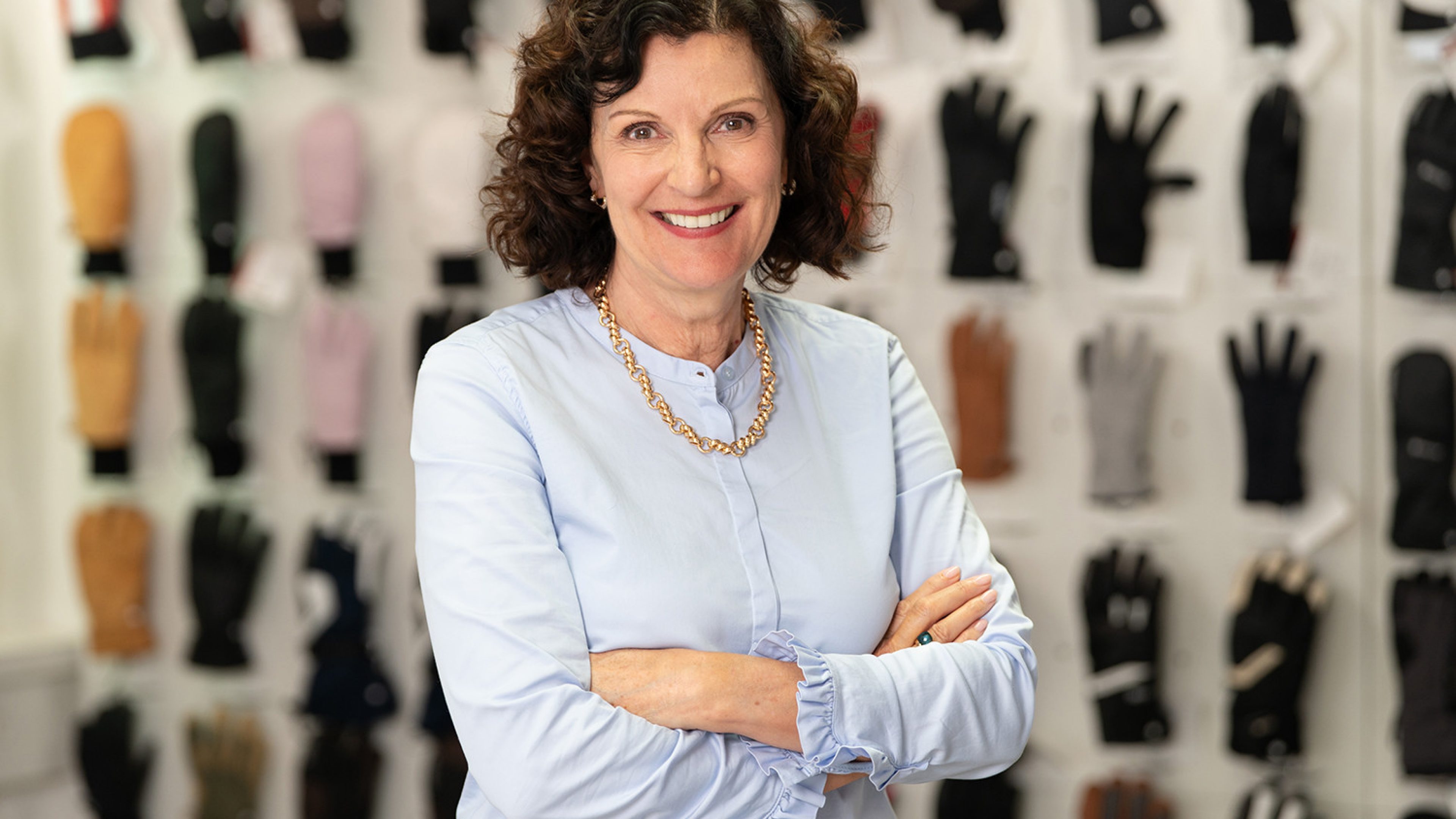 Portrait von Daniela Wenk, zufriedene Kundin von Swiss Life Wealth Managers, fotografiert in ihrem Unternehmen.